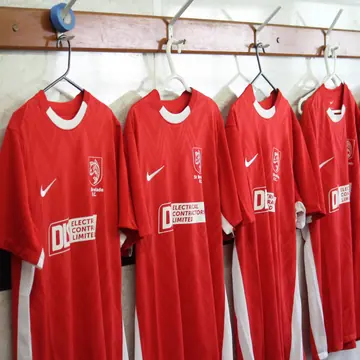 St Brelade FC shirts hanging in the dressing room